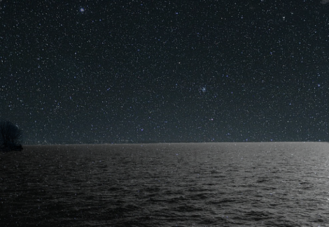 a calm ocean at night